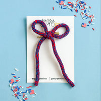 Blue and Red Knit Bow